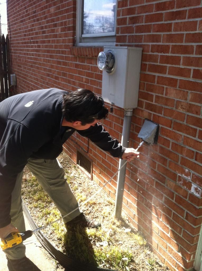 Professional technician working on vent
